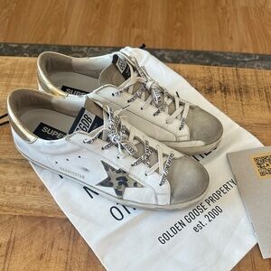 Golden Goose Superstar Sneakers in White and Gold